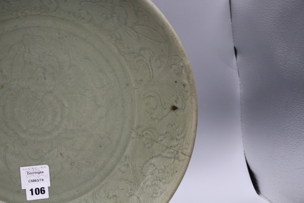 A 15th / 16th century Longquan celadon dish, incised with flowers, diameter 43cm, height 8.5cm